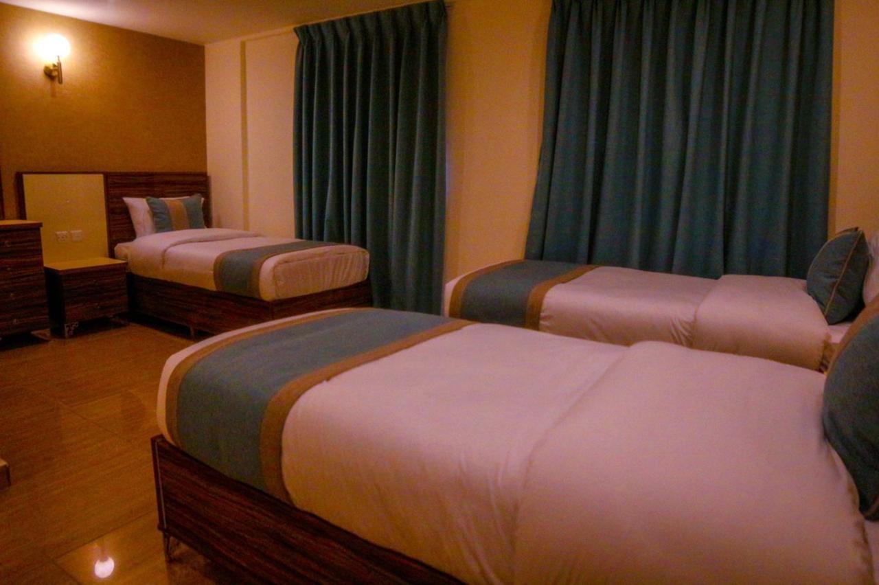 ِafnan Hotel Aqaba Bagian luar foto