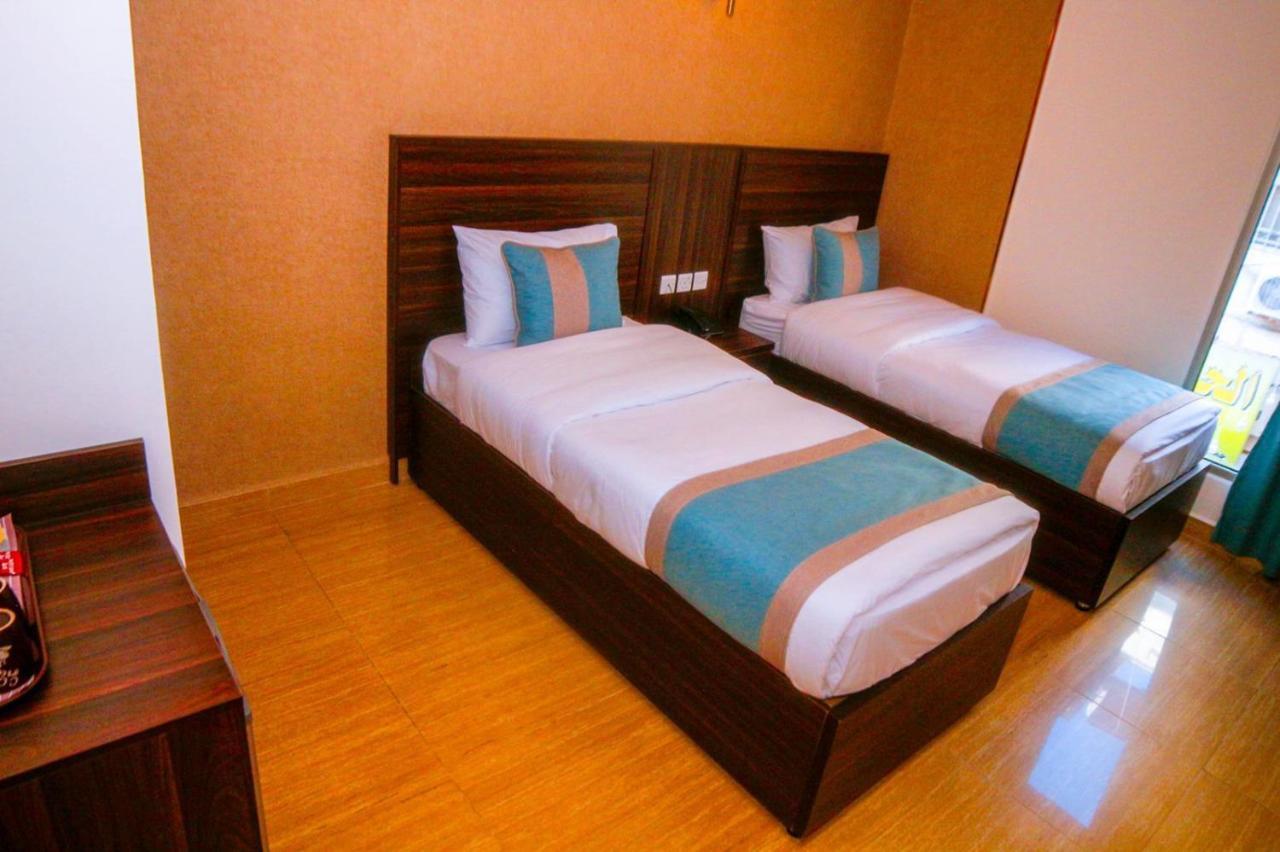 ِafnan Hotel Aqaba Bagian luar foto