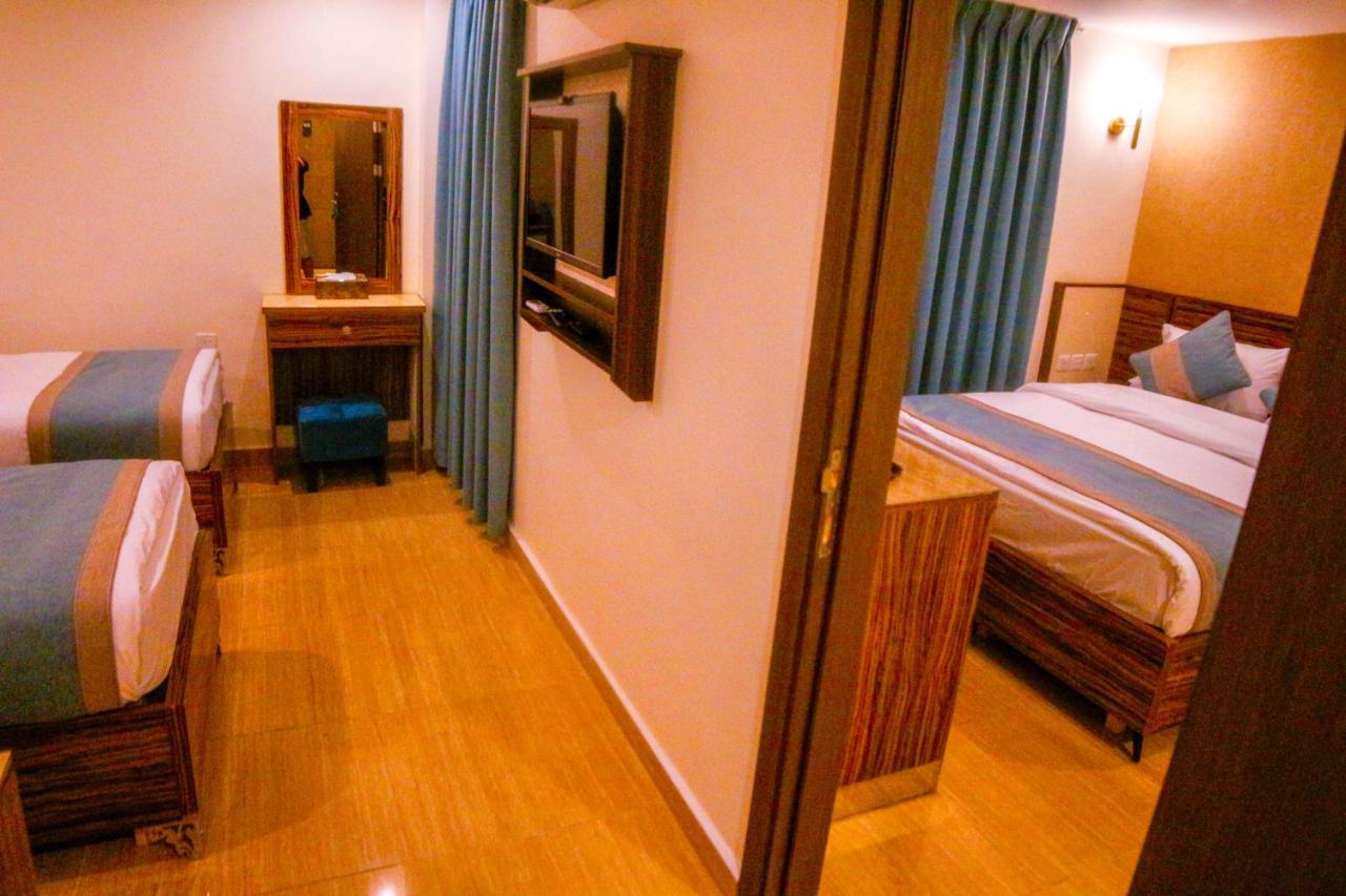 ِafnan Hotel Aqaba Bagian luar foto